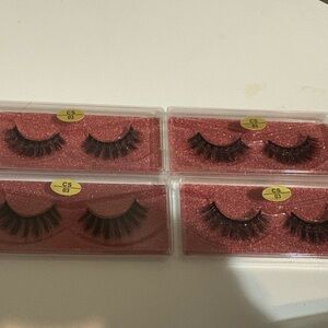 Set of False Eyelashes with Pink Glitter Background
